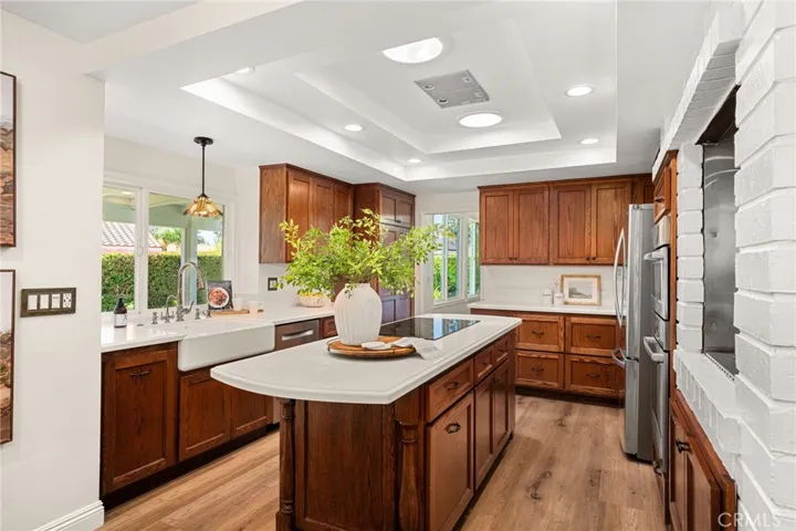 Updated kitchen with quartz countertops and updated lighting and skylights.