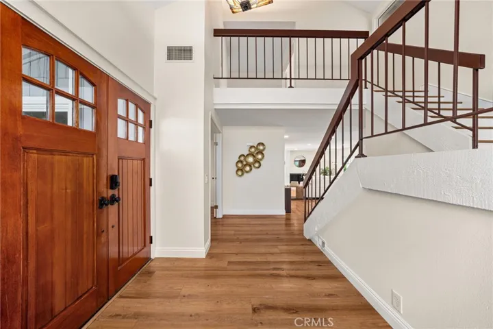 Entrance with upgraded front doors.