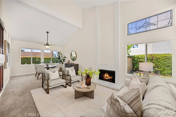 Entertaining space featuring the first of three fireplaces.