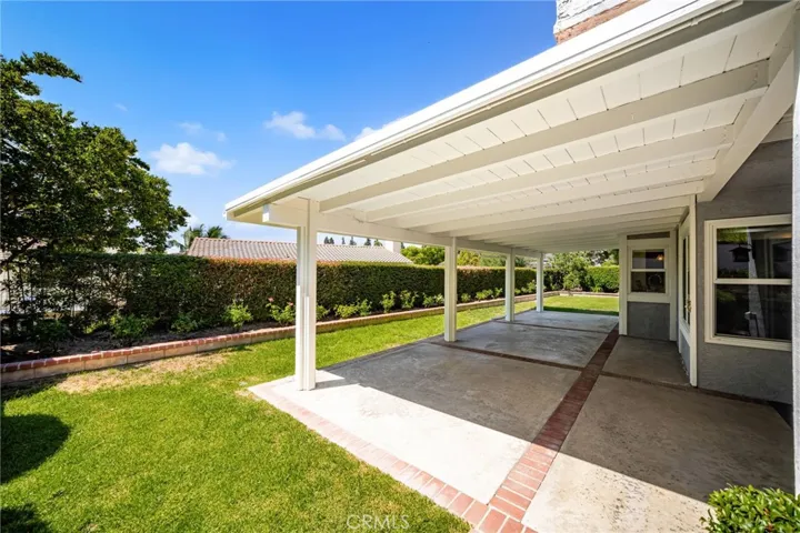 Spacious covered patio perfect for entertaining large and small gatherings.