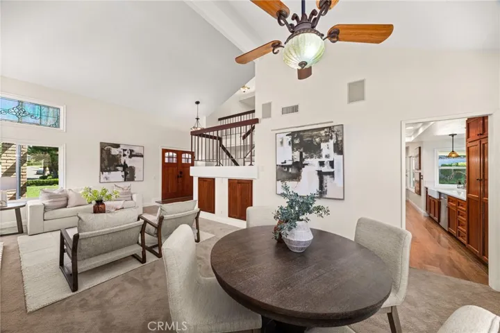 Entertaining area with direct with access to the kitchen. Pocket door can be closed to separate the spaces.