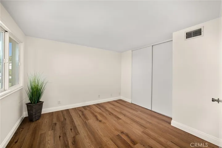 Main floor bedroom or office. Closet can be used for various storage needs.