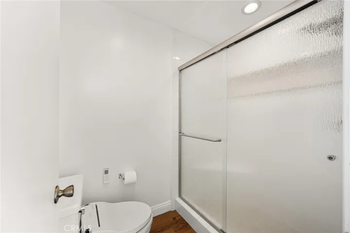 Separate shower and toilet area.