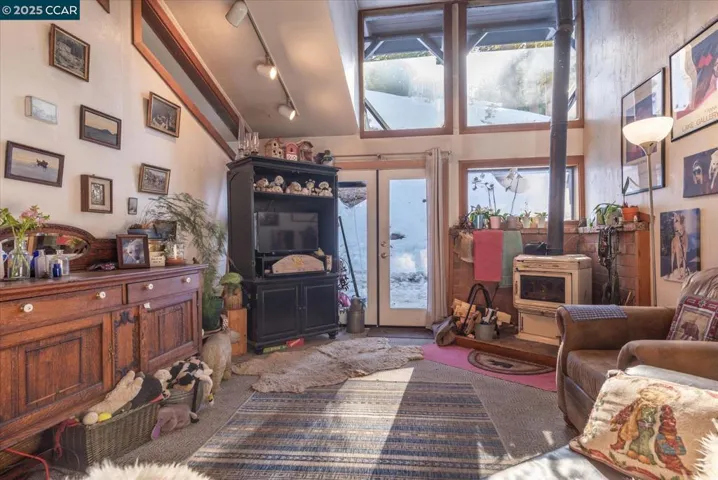 Bright and welcoming living space with direct outdoor access, perfect for enjoying fresh mountain air.
