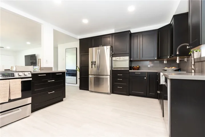 Stainless steel appliances and sink.