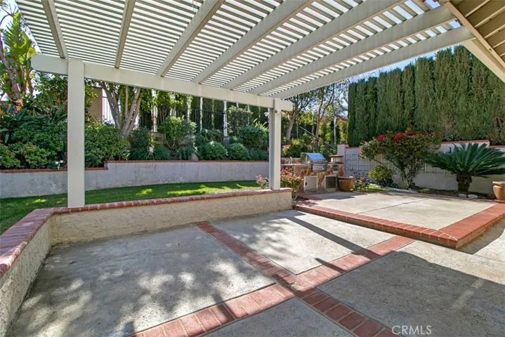 Large yard with covered patio