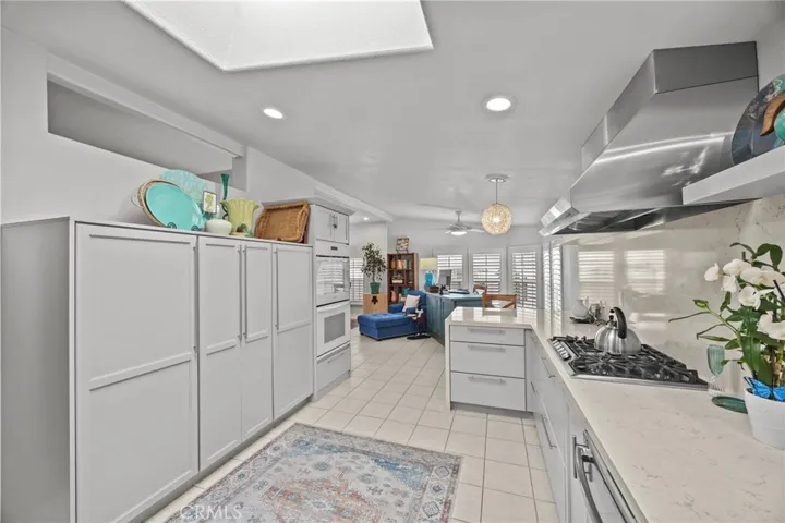 CUSTOM DESIGNED KITCHEN AND CABINETRY