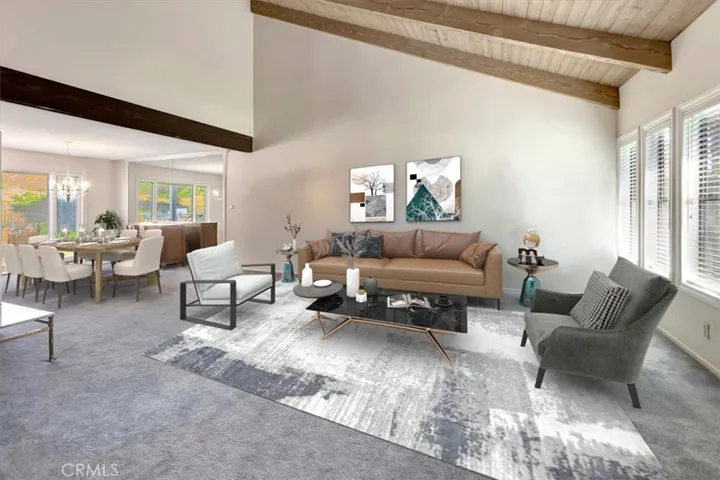 Virtually staged living room.  Vaulted ceilings.