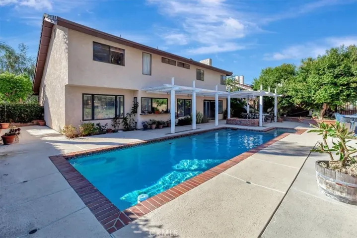 Pool and spa with covered patio, BBQ
