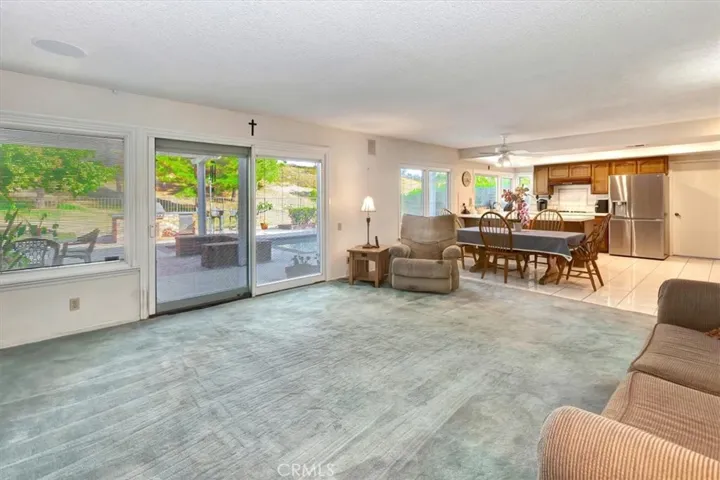 Spacious family room.  Views to backyard pool.