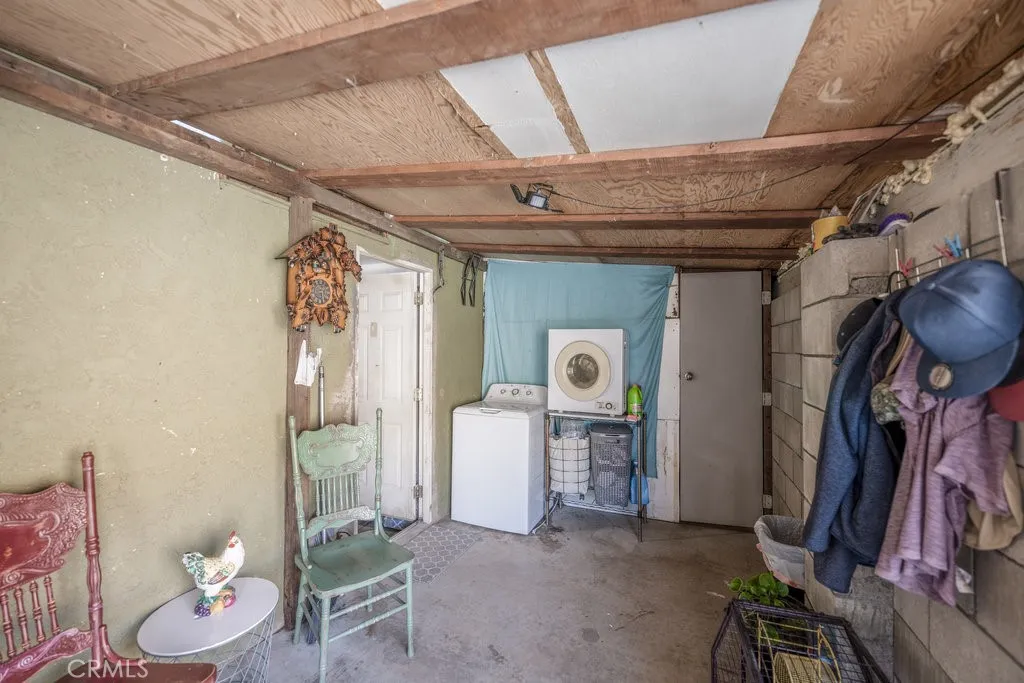 Mud room with laundry area and 1/2 bath