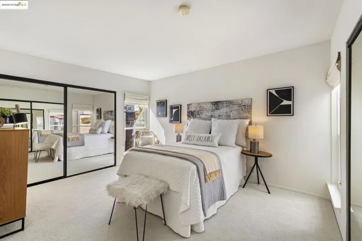 Bedroom with carpet flooring and baseboards