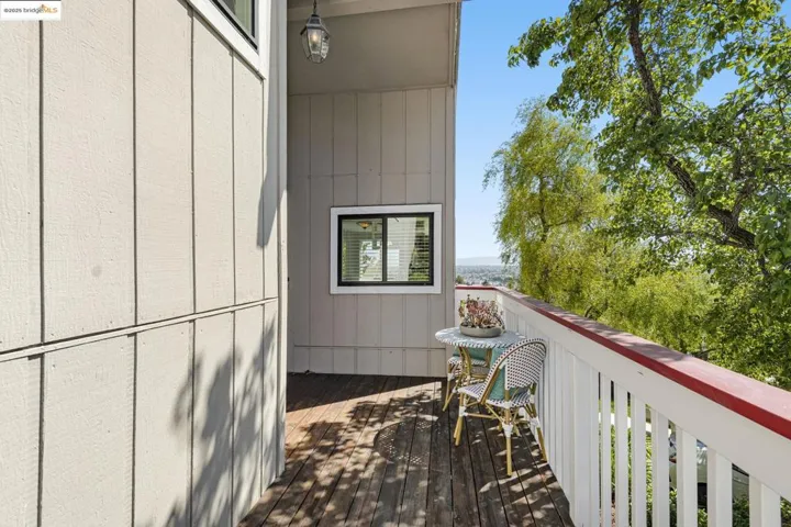 View of wooden balcony featuring a deck