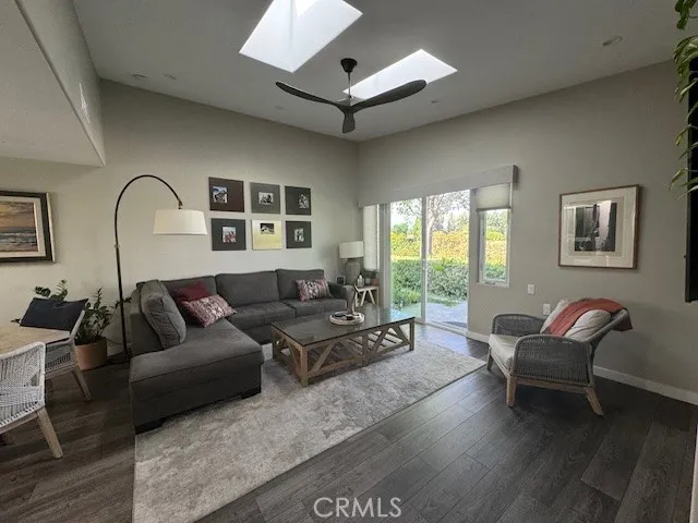 Living Space with Fireplace and Large TV.