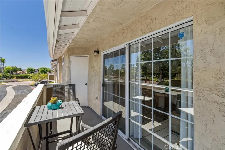 Private patio off living room, space for a grill.