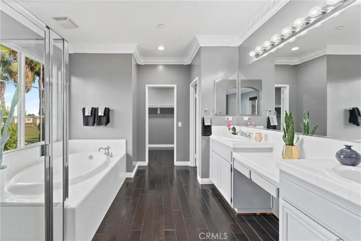 Large primary bathroom with dual vanity