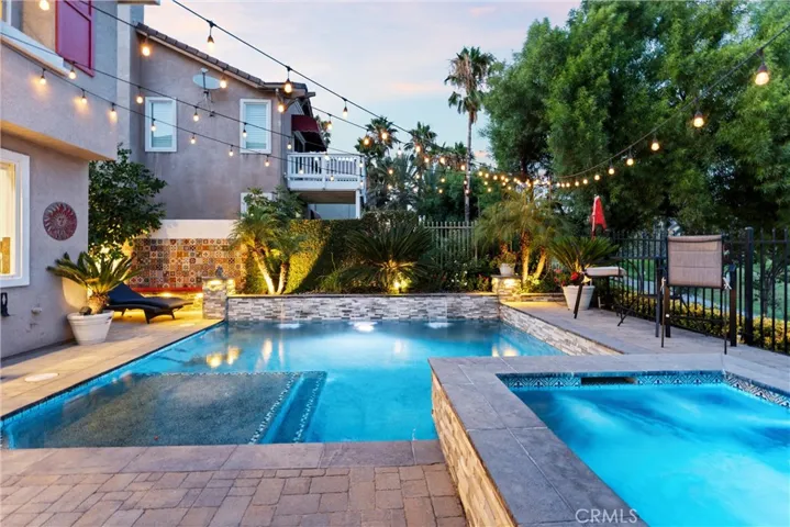 Pool with resort-style waterfall
