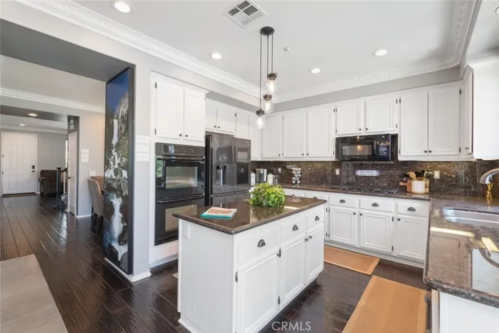 Plenty of counter space and cabinets throughout