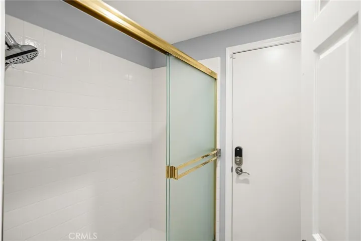 Easy access first floor shower comes with a door to the side yard