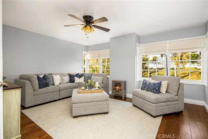 In the front of the upstairs is the 2nd bedroom or bonus room complete with the same gorgeous wood floors