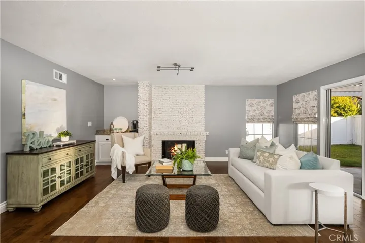 Morning coffee station or evening bar tucked aside the elegant fireplace