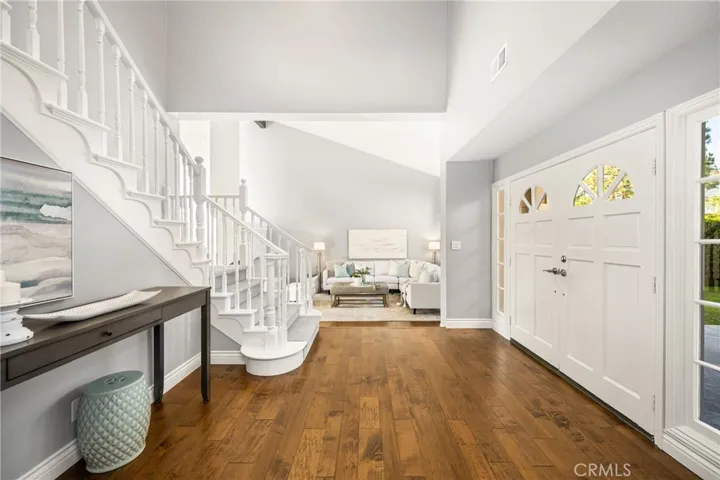 Sweeping staircase leads to the second level