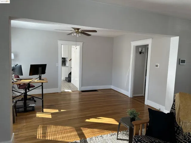 Dining Room with wood finished floors and ceiling fan