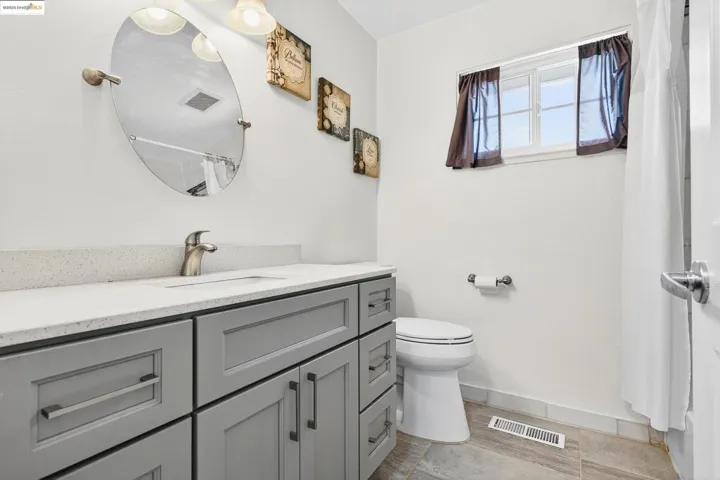 Bathroom featuring vanity and a shower with curtain