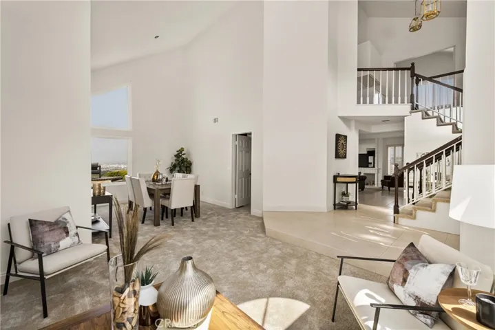 Light-Filled Living and Dining with Elegant Staircase