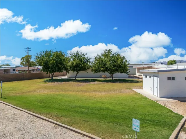 Guest parking and laundry facility across from house
