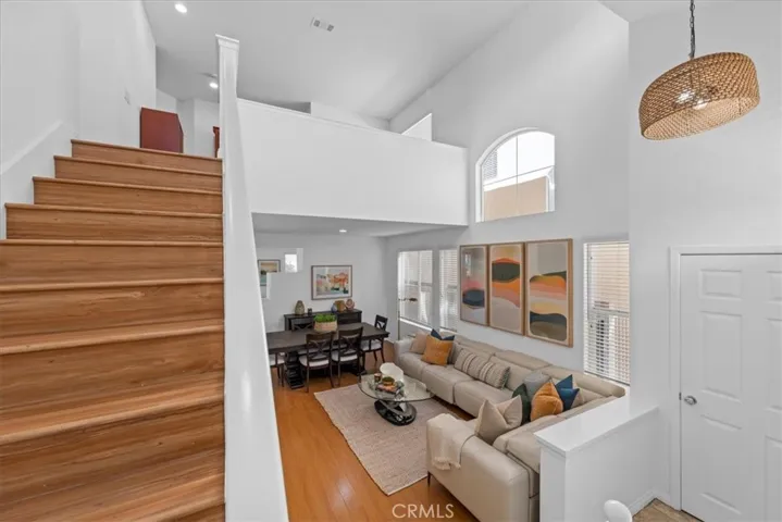 Stairs lead to an upstairs Loft, Laundry Room, 4 Bedrooms & 2 Full Bathrooms