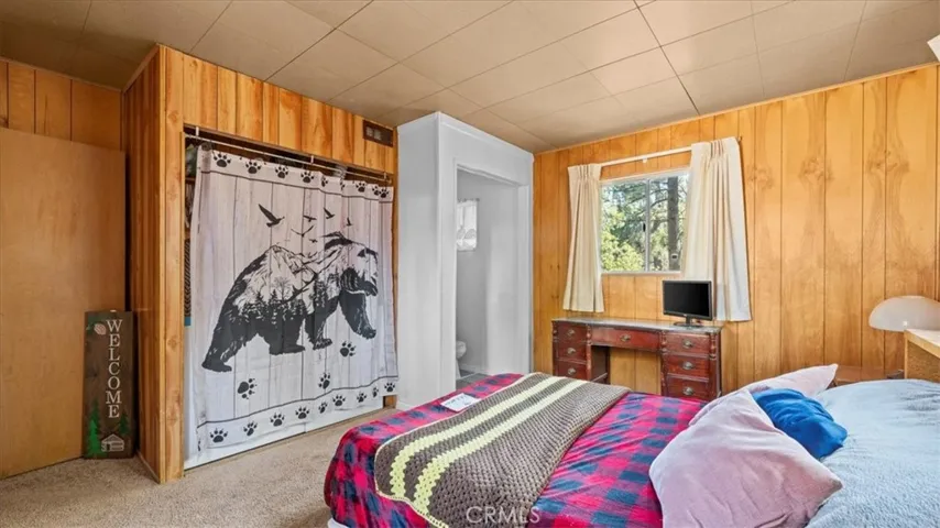 Primary Suite Bedroom / Laundry