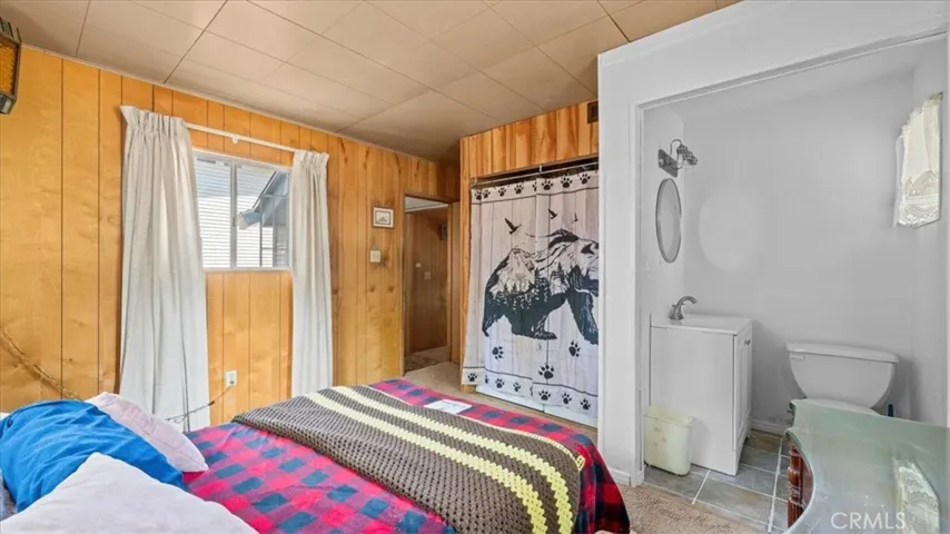 Primary Suite Bedroom / Laundry