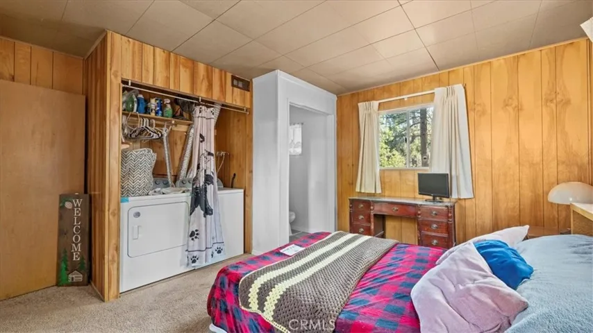 Primary Suite Bedroom / Laundry
