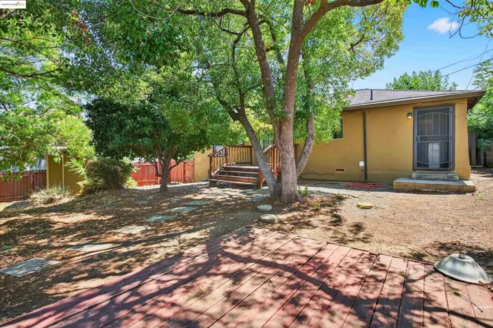 View of yard with a deck