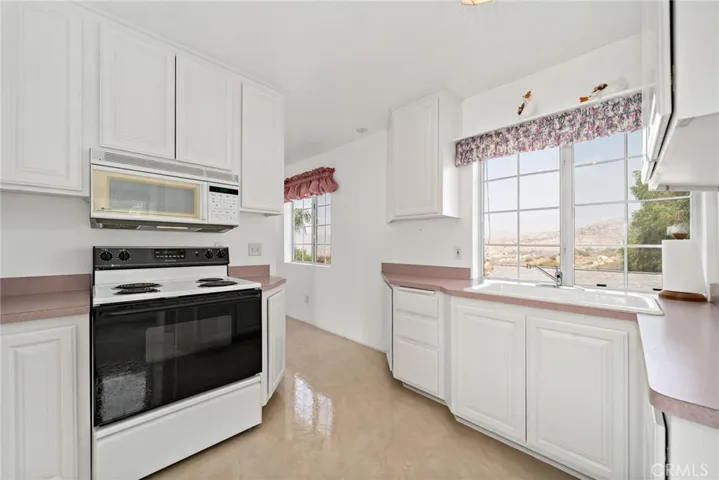 Upstairs living area kitchen w views of Mt Jacinto