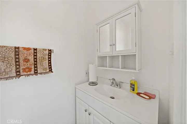 Half bath w access from exterior. Perfect for cleaning up before entering the home.