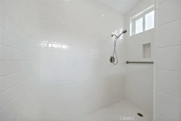 Tiled and spacious walk in shower