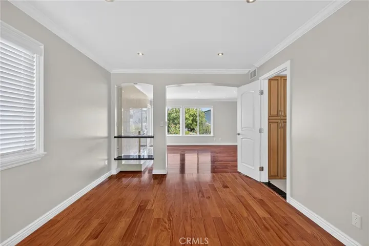 Living room leads to formal dining area