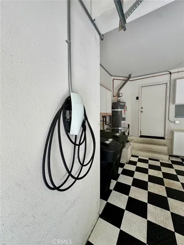 Tesla charger in garage included