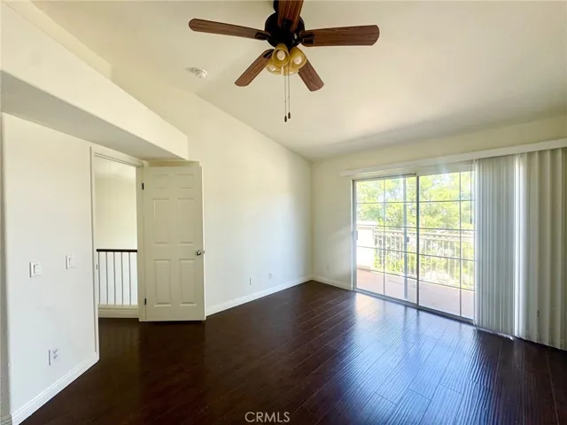 Primary bedroom with private balcony