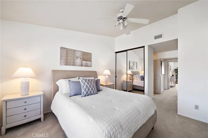 This Popular Model Boasts 2 Large Primary Suites, Each Showcases Vaulted Ceilings, Two Mirrored Closets, and Private Ensuite Bathrooms with Sit-Down Vanities.
