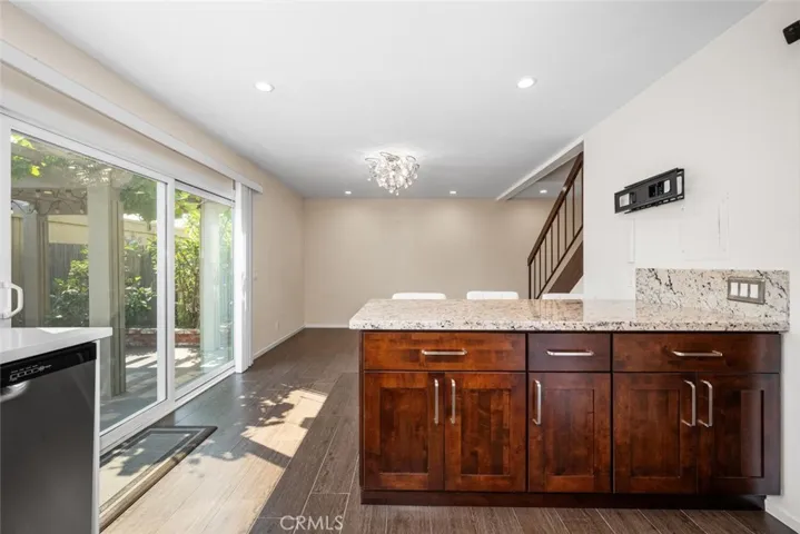 Added peninsula in kitchen with Granite Countertop and providing lots of additional storage.