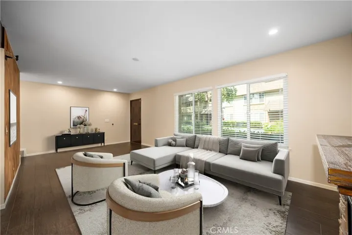 Virtually staged living room entry area. This home offers forced air heating and cooling with recently installed Milgard Windows throughout.