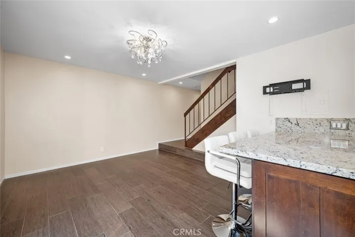 Family room area in kitchen before staging.