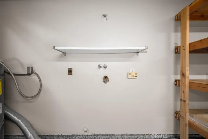 Laundry area located in the garage, hookup for Electric Dryer.
