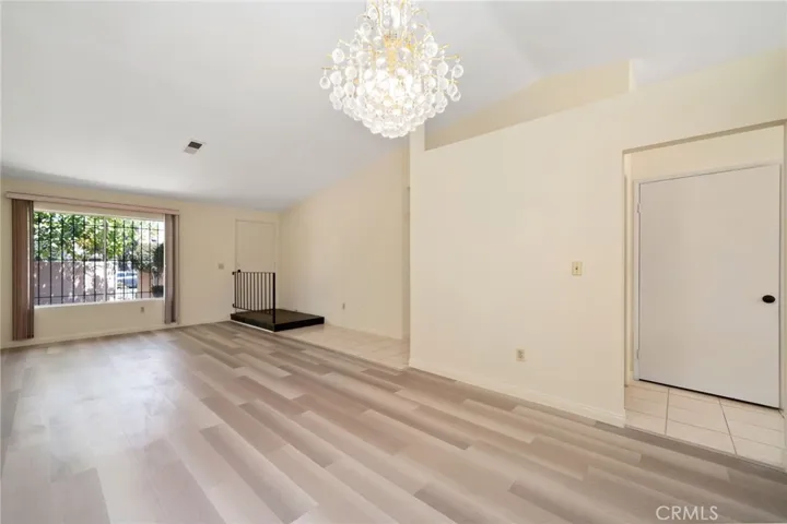 ** virtual staging ** Formal Living Room and Entry Way with soaring high ceiling