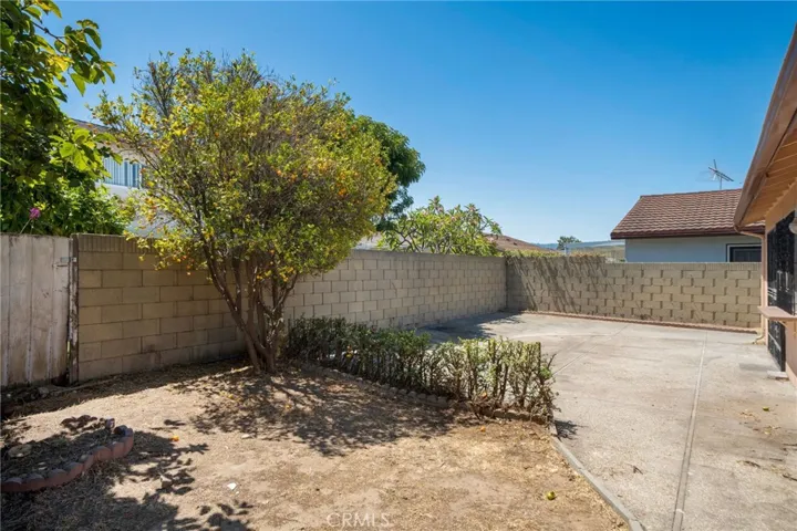 The generous backyard is a blank canvas, ready for your personal touch – garden, play space, or outdoor retreat.