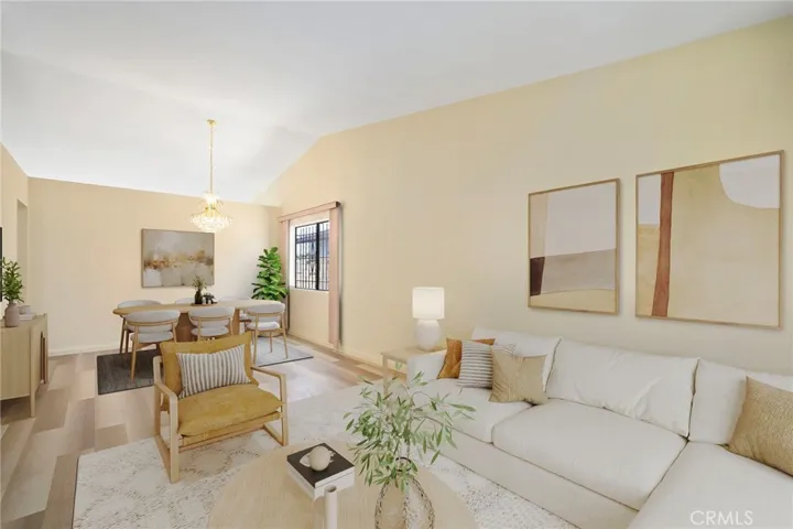 another angle of the formal living and dining room with High Ceilings and Newer Flooring