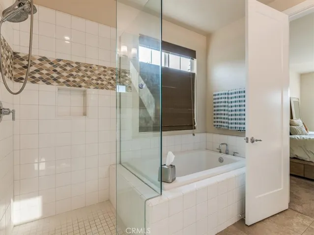 Primary Bath with walk in shower and soaking tub